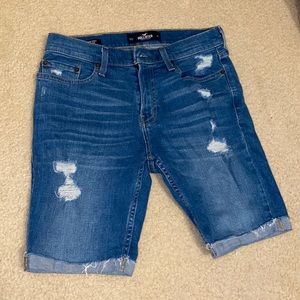 RIPPED MEDIUM WASH SKINNY DENIM SHORT 9"